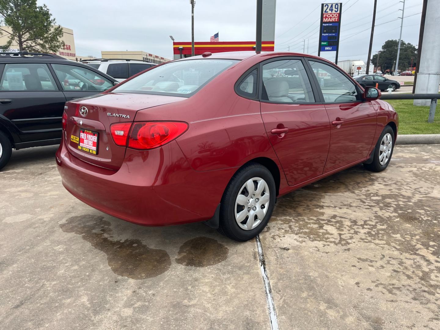 2008 red /TAN Hyundai Elantra GLS (KMHDU46D78U) with an 2.0L L4 DOHC 16V engine, Manual transmission, located at 14700 Tomball Parkway 249, Houston, TX, 77086, (281) 444-2200, 29.928619, -95.504074 - Photo#6